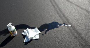 remove transmission fluid stains
